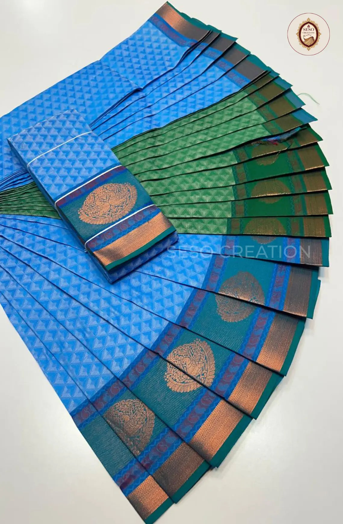 Pavithra Plain Emboss Semi Silk Saree - Aqua Blue
