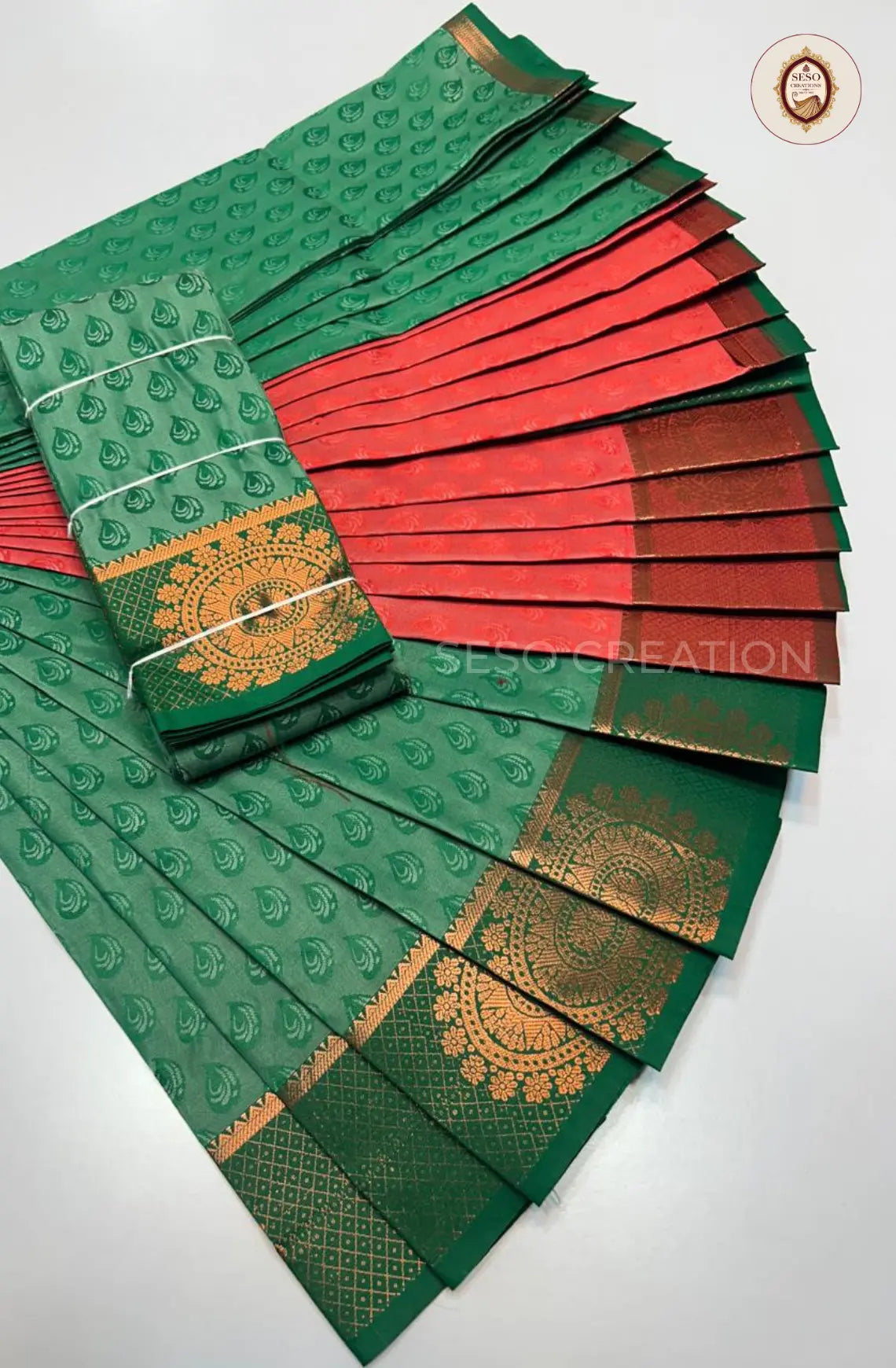 Pavithra Plain Emboss Semi Silk Saree - Bottle Green