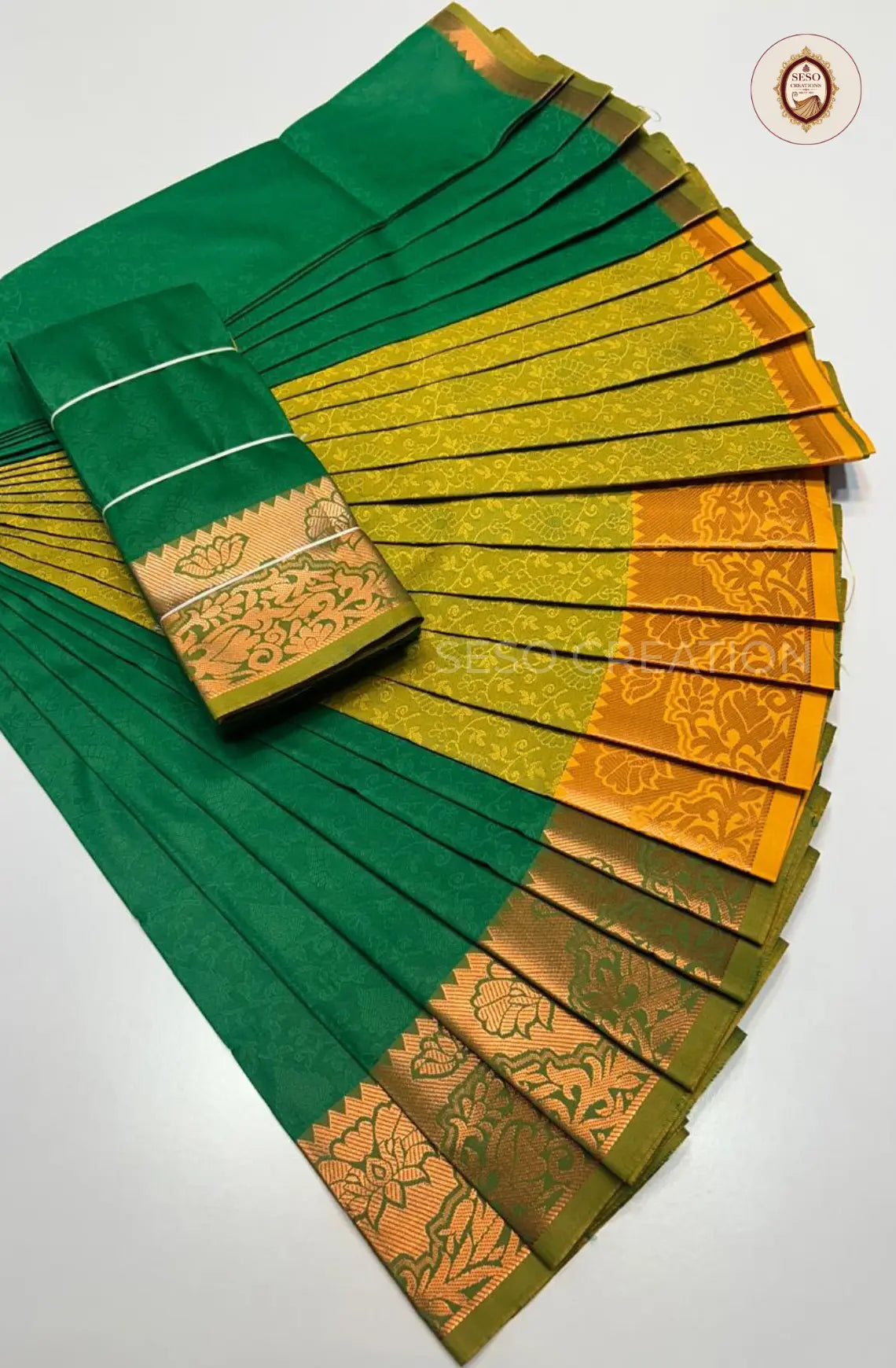 Pavithra Plain Emboss Semi Silk Saree - Green