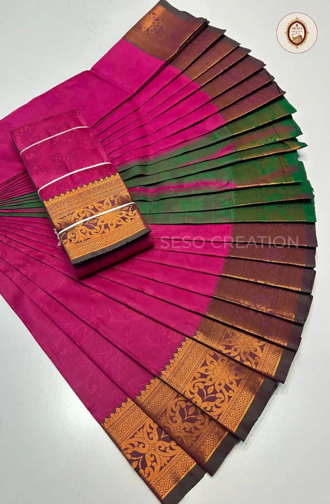 Pavithra Plain Emboss Semi Silk Saree - Rani