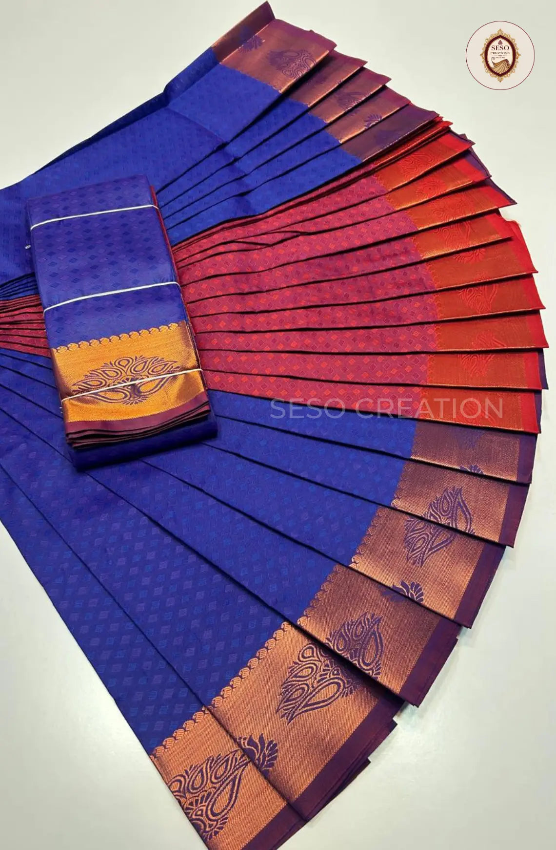 Pavithra Plain Emboss Semi Silk Saree - Royal Blue