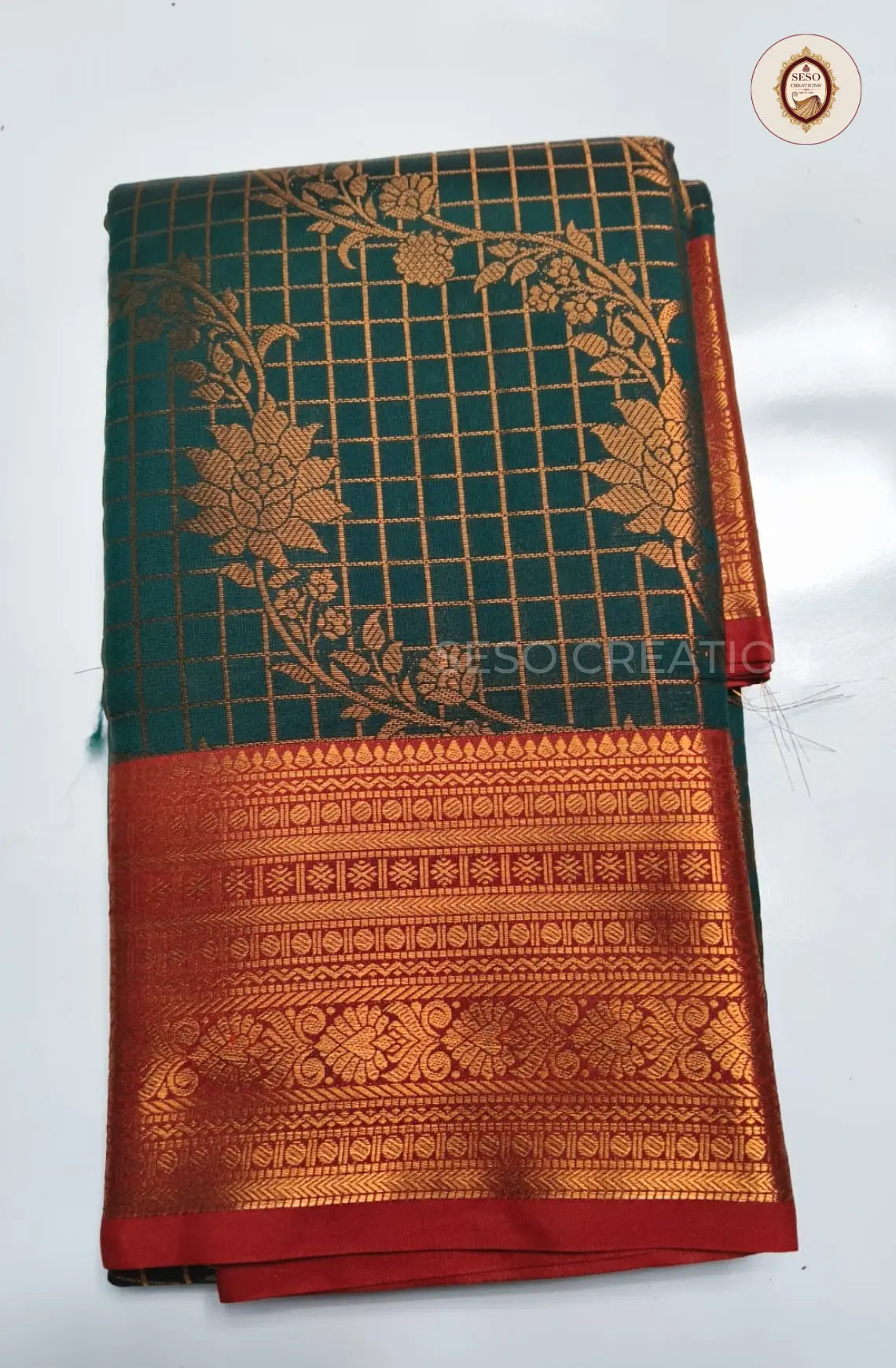 Semi Soft Silk Checked Saree with Floral Butta - Dark Green