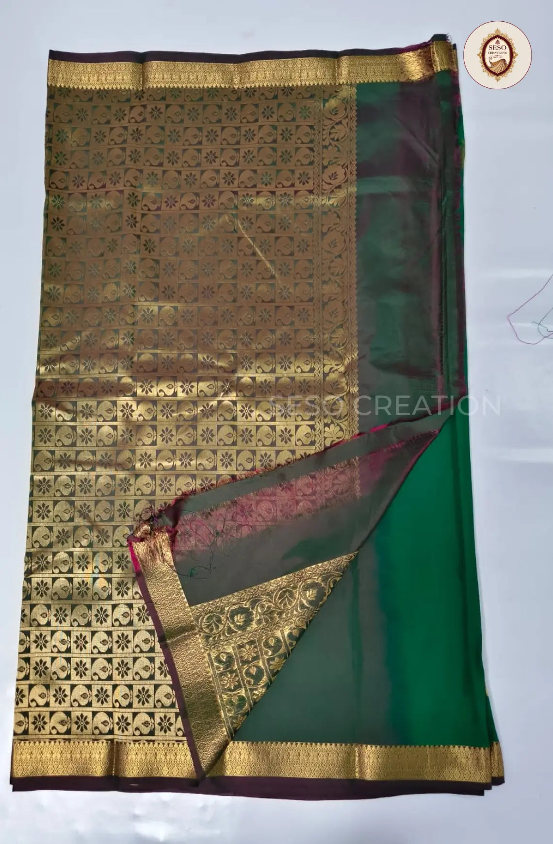 Semi Soft Silk Saree with Zari Woven Border - Green