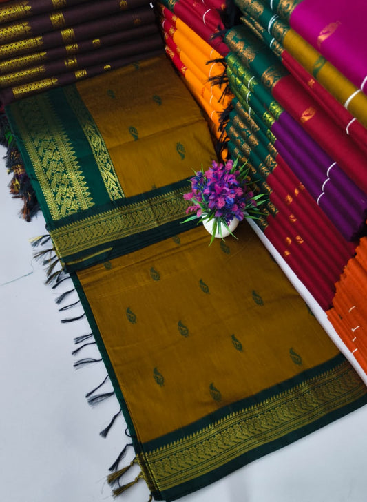 Kalyani Cotton – Mustard Dark Yellow with Bottle Green border & pallu – Gold Zari – Korvai Border