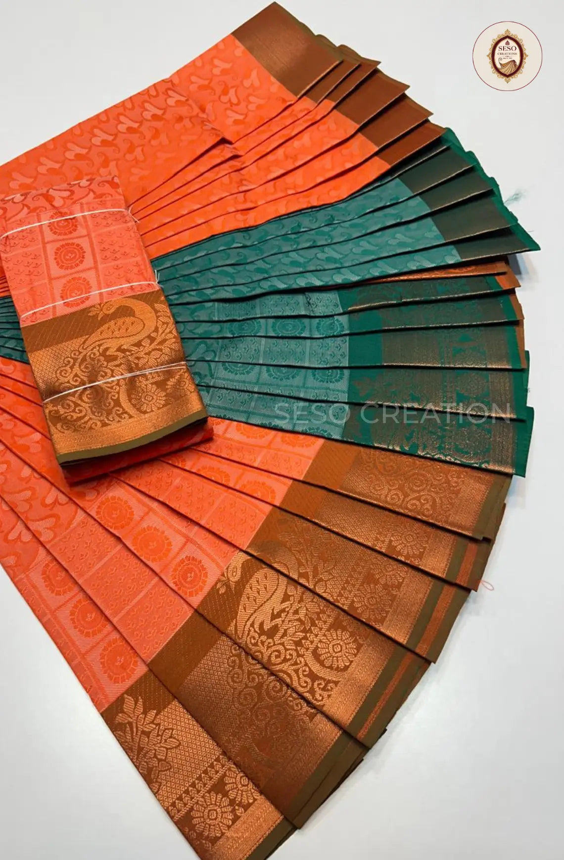 Pavithra Plain Emboss Semi Silk Saree - Orange