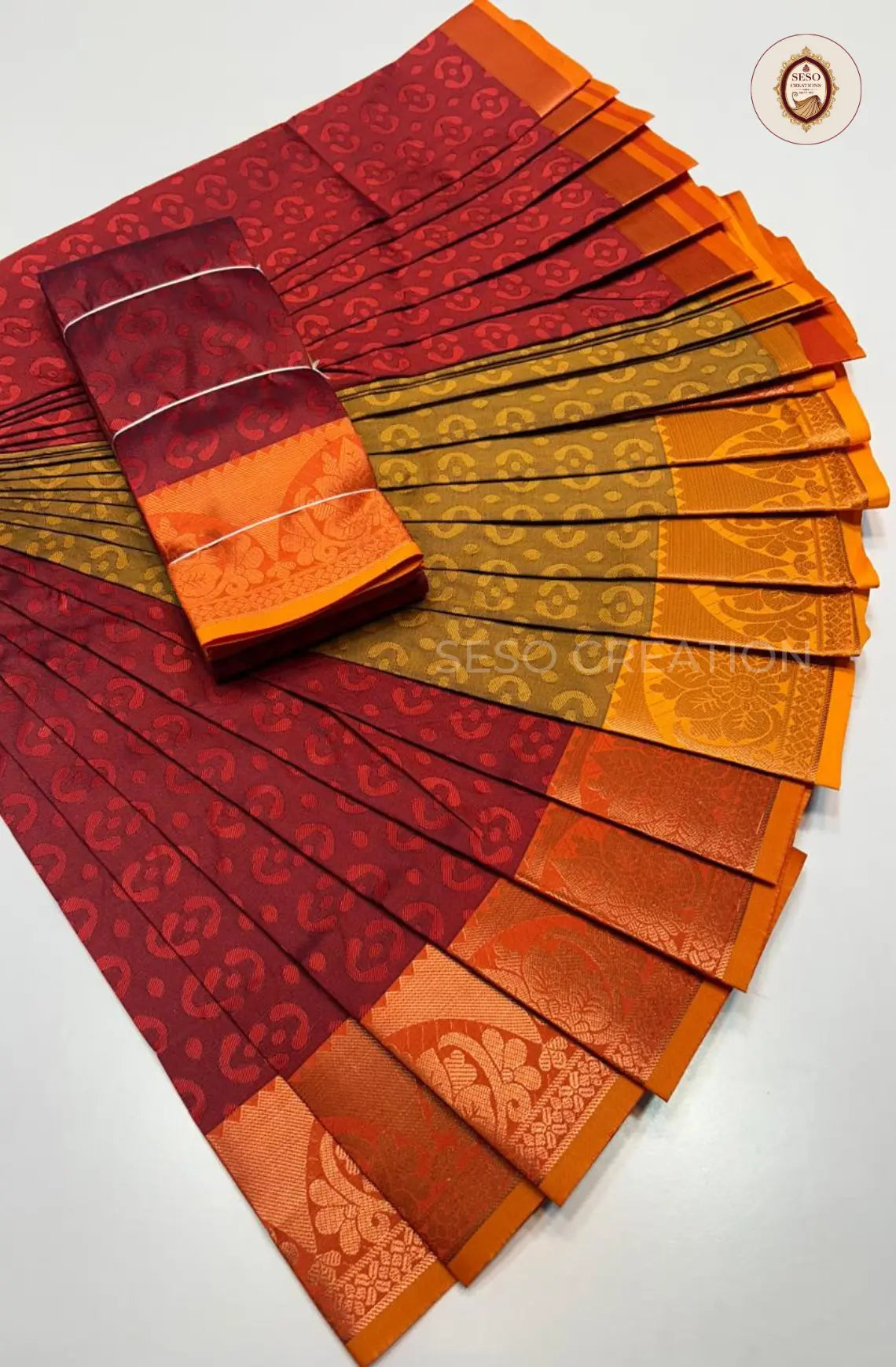 Pavithra Plain Emboss Semi Silk Saree - Red