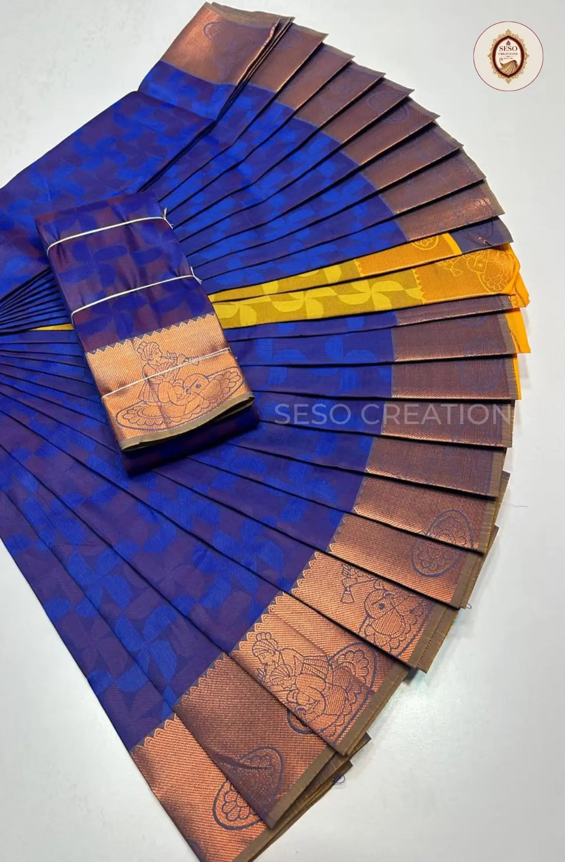 Pavithra Plain Emboss Semi Silk Saree - Violet