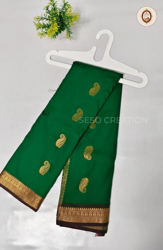 Semi Soft Silk Saree with Zari Woven Border - Green